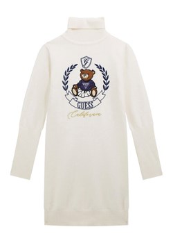 Guess Sukienka dzianinowa J5BK21 Z3GS0 Écru Regular Fit ze sklepu MODIVO w kategorii Sukienki dziewczęce - zdjęcie 186029335