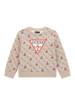 Guess Bluza N5BQ05 KAD74 Beżowy Regular Fit ze sklepu MODIVO w kategorii Bluzy dziewczęce - zdjęcie 186029476