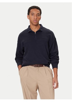 Tommy Hilfiger Bluza UM0UM03626 Granatowy Regular Fit ze sklepu MODIVO w kategorii Bluzy męskie - zdjęcie 186029666