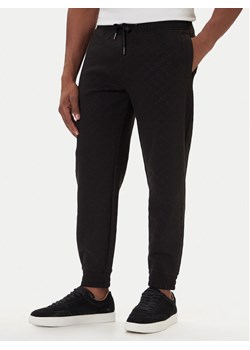 JOOP! Spodnie dresowe 17 JJ-31Benzio 30047443 Czarny Regular Fit ze sklepu MODIVO w kategorii Spodnie męskie - zdjęcie 186030636