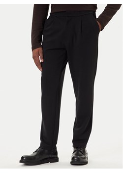 Calvin Klein Chinosy LV04LE613G Czarny Slim Fit ze sklepu MODIVO w kategorii Spodnie męskie - zdjęcie 186030637