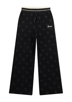 Guess Spodnie dresowe J5BQ17 K1902 Czarny Wide Leg ze sklepu MODIVO w kategorii Spodnie dziewczęce - zdjęcie 186030825