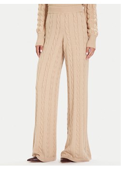 Guess Spodnie dzianinowe W5BB52 Z1192 Beżowy Regular Fit ze sklepu MODIVO w kategorii Spodnie damskie - zdjęcie 186032098