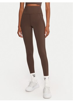 Reebok Legginsy Reebok X Ewa Chodakowska RK25313CCW Brązowy Slim Fit ze sklepu MODIVO w kategorii Spodnie damskie - zdjęcie 186032507
