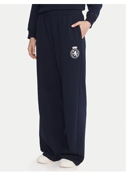 Tommy Hilfiger Spodnie dresowe UW0UW06081 Granatowy Wide Leg ze sklepu MODIVO w kategorii Spodnie damskie - zdjęcie 186033426