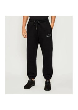 Guess Jeans Spodnie dresowe | Relaxed fit ze sklepu Gomez Fashion Store w kategorii Spodnie męskie - zdjęcie 186059446