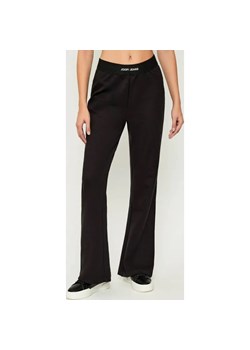 Joop! Jeans Spodnie dresowe Tuvana | flare fit ze sklepu Gomez Fashion Store w kategorii Spodnie damskie - zdjęcie 186067829