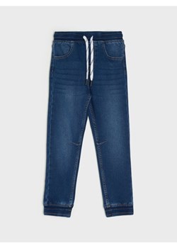 Sinsay - Jeansy jogger z efektem sprania - granatowy ze sklepu Sinsay w kategorii Spodnie chłopięce - zdjęcie 186084156