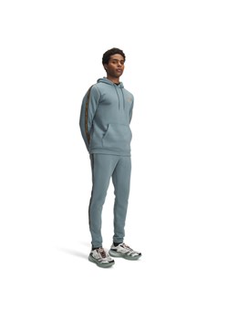 Męskie spodnie dresowe Under Armour UA Icon Fleece Jogger Taping - niebieskie ze sklepu Sportstylestory.com w kategorii Spodnie męskie - zdjęcie 186095289