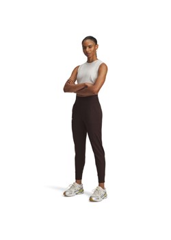 Damskie spodnie treningowe Under Armour Motion Jogger - brązowe ze sklepu Sportstylestory.com w kategorii Spodnie damskie - zdjęcie 186095578