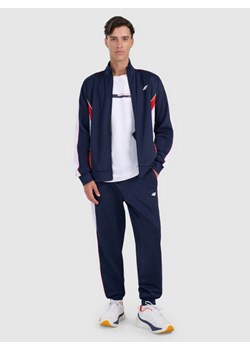 Męskie spodnie dresowe joggery 4F 4FRAW25TTROM1611 - granatowe ze sklepu Sportstylestory.com w kategorii Spodnie męskie - zdjęcie 186096015