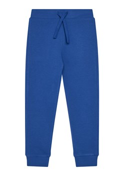 United Colors Of Benetton Spodnie dresowe 3J68CF01P Niebieski Regular Fit ze sklepu MODIVO w kategorii Spodnie chłopięce - zdjęcie 186125067