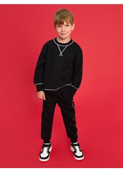 Sinsay - Spodnie dresowe - czarny - id: 990FS-99X - marki Sinsay - 186130359 Sinsay - Spodnie dresowe - czarny ze sklepu Sinsay w kategorii Spodnie chłopięce - zdjęcie 186130359