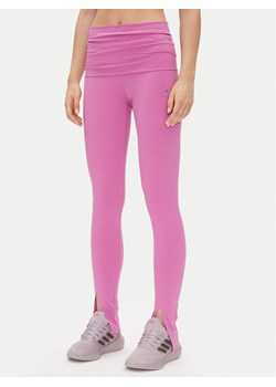 adidas by Stella McCartney Legginsy TrueStrength JJ1629 Różowy Slim Fit ze sklepu MODIVO w kategorii Spodnie damskie - zdjęcie 186136577