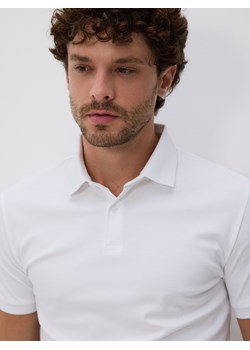 Reserved - Polo slim z bawełny pima - złamana biel ze sklepu Reserved w kategorii T-shirty męskie - zdjęcie 186142458