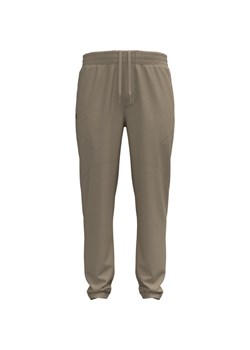 Męskie spodnie Under Armour UA Unstoppable Tapered Pants - brązowe ze sklepu Sportstylestory.com w kategorii Spodnie męskie - zdjęcie 186149687