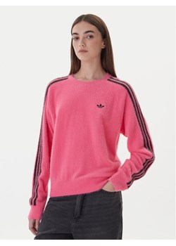 adidas Bluza adicolor Holiday JX7811 Różowy Loose Fit ze sklepu MODIVO w kategorii Bluzy damskie - zdjęcie 186151289