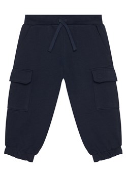United Colors Of Benetton Spodnie dresowe 3J68GF045 Granatowy Regular Fit ze sklepu MODIVO w kategorii Spodnie chłopięce - zdjęcie 186151337