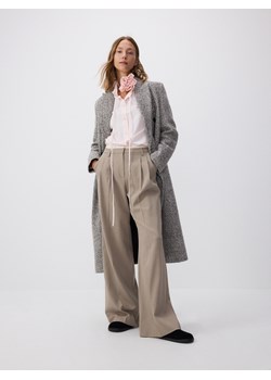 Reserved - Spodnie z kontrastową wstawką - beżowy ze sklepu Reserved w kategorii Spodnie damskie - zdjęcie 186170849
