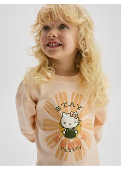 Reserved - Bluzka z nadrukiem Hello Kitty - brzoskwiniowy ze sklepu Reserved w kategorii Bluzki dziewczęce - zdjęcie 186177485