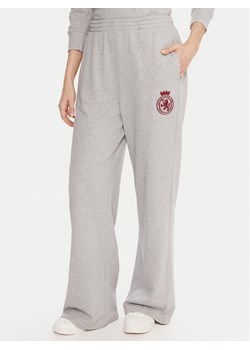 Tommy Hilfiger Spodnie dresowe UW0UW06081 Szary Wide Leg ze sklepu MODIVO w kategorii Spodnie damskie - zdjęcie 186186797