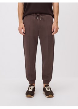 Reserved - Spodnie dresowe slim fit - beżowy ze sklepu Reserved w kategorii Spodnie męskie - zdjęcie 186190069