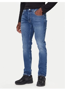 Tommy Jeans Jeansy DM0DM22168 Niebieski Regular Fit ze sklepu MODIVO w kategorii Jeansy męskie - zdjęcie 186205909