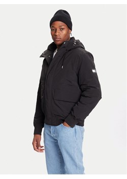Tommy Jeans Kurtka zimowa DM0DM22032 Czarny Regular Fit ze sklepu MODIVO w kategorii Kurtki męskie - zdjęcie 186225966