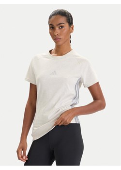 adidas T-Shirt Holiday 3-Stripes JM1880 Beżowy Slim Fit ze sklepu MODIVO w kategorii Bluzki damskie - zdjęcie 186247799
