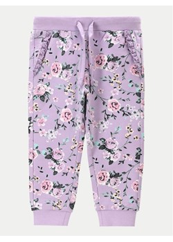 Coccodrillo Spodnie dresowe WC4120101GEN Fioletowy Regular Fit ze sklepu MODIVO w kategorii Spodnie i półśpiochy - zdjęcie 186247859