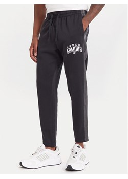 Under Armour Spodnie dresowe Ua Rival Fleece Colorblock 6003954 Czarny Loose Fit ze sklepu MODIVO w kategorii Spodnie męskie - zdjęcie 186267446