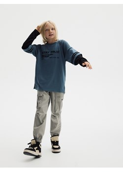 Reserved - Spodnie cargo na polarowej podszewce - jasnoszary ze sklepu Reserved w kategorii Spodnie chłopięce - zdjęcie 186281958