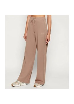 GUESS ACTIVE Spodnie dresowe OCTAVIA | Relaxed fit ze sklepu Gomez Fashion Store w kategorii Spodnie damskie - zdjęcie 186301835