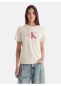 Calvin Klein Jeans T-Shirt Hero LV047B865G Beżowy Regular Fit ze sklepu MODIVO w kategorii Bluzki damskie - zdjęcie 186323555