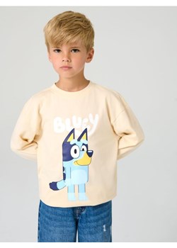 Sinsay - Koszulka z długimi rękawami Bluey - kremowy ze sklepu Sinsay w kategorii T-shirty chłopięce - zdjęcie 186385735