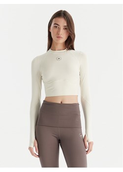 adidas by Stella McCartney Koszulka techniczna Training JM1403 Beżowy Slim Fit - id: 0000305180766 - marki adidas - 186450596 adidas by Stella McCartney Koszulka techniczna Training JM1403 Beżowy Slim Fit ze sklepu MODIVO w kategorii Bluzki damskie - zdjęcie 186450596