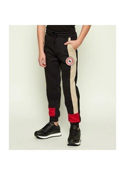 Guess Spodnie dresowe | Regular Fit ze sklepu Gomez Fashion Store w kategorii Spodnie chłopięce - zdjęcie 186460046