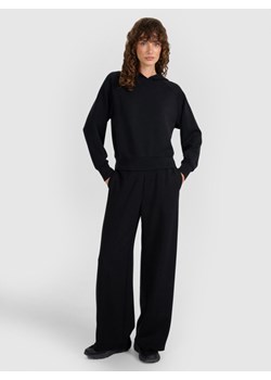 Damskie spodnie dresowe 4F 4FWAW25TTROF1181 - czarne ze sklepu Sportstylestory.com w kategorii Spodnie damskie - zdjęcie 186540598