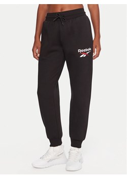 Reebok Spodnie dresowe Stacey RK25166CCW Czarny Regular Fit ze sklepu MODIVO w kategorii Spodnie damskie - zdjęcie 186576567