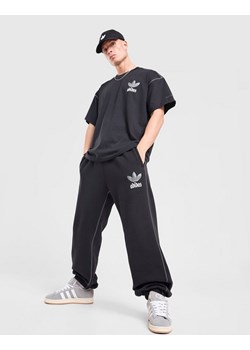 ADIDAS SPODNIE GFX PT LO ze sklepu JD Sports  w kategorii Spodnie męskie - zdjęcie 186612146