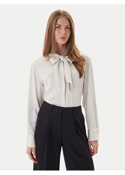 Calvin Klein Bluzka LV044D125G Beżowy Regular Fit ze sklepu MODIVO w kategorii Bluzki damskie - zdjęcie 186655207