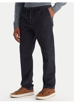 Quiksilver Spodnie materiałowe Taxer EQYNP03315 Granatowy Loose Fit ze sklepu MODIVO w kategorii Spodnie męskie - zdjęcie 186655256
