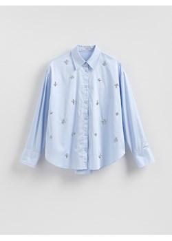 Reserved - Koszula z błyszczącymi aplikacjami - jasnoniebieski - id: 589EH-50X - marki Reserved - 186678208 Reserved - Koszula z błyszczącymi aplikacjami - jasnoniebieski ze sklepu Reserved w kategorii Koszule damskie - zdjęcie 186678208
