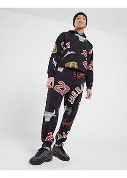 JORDAN SPODNIE M J ESS AOP FLC PANT ze sklepu JD Sports  w kategorii Spodnie męskie - zdjęcie 186684179
