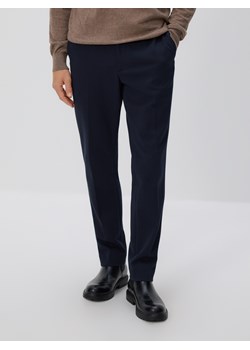 Reserved - Spodnie garniturowe slim fit - granatowy ze sklepu Reserved w kategorii Spodnie męskie - zdjęcie 186712325