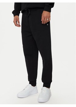 United Colors Of Benetton Spodnie dresowe 342ZUF01B Czarny Regular Fit ze sklepu MODIVO w kategorii Spodnie męskie - zdjęcie 186713145
