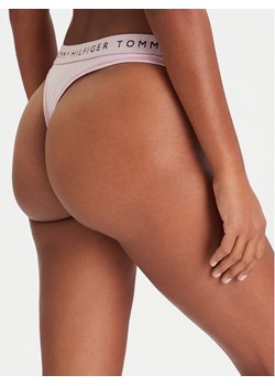 Tommy Hilfiger Stringi UW0UW06039 Różowy ze sklepu MODIVO w kategorii Majtki damskie - zdjęcie 186729475