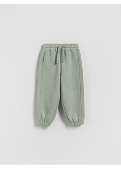 Reserved - Ocieplane spodnie jogger - jasnozielony ze sklepu Reserved w kategorii Spodnie chłopięce - zdjęcie 186736919