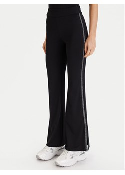 MICHAEL Michael Kors Legginsy MF530W51RE Czarny Flare Fit ze sklepu MODIVO w kategorii Spodnie damskie - zdjęcie 186741038