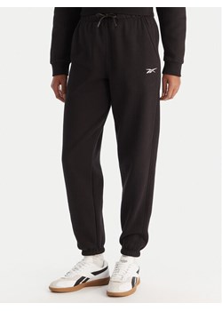 Reebok Spodnie dresowe Reebok X Ewa Chodakowska Evren RK25308CCW Czarny Regular Fit ze sklepu MODIVO w kategorii Spodnie damskie - zdjęcie 186818266